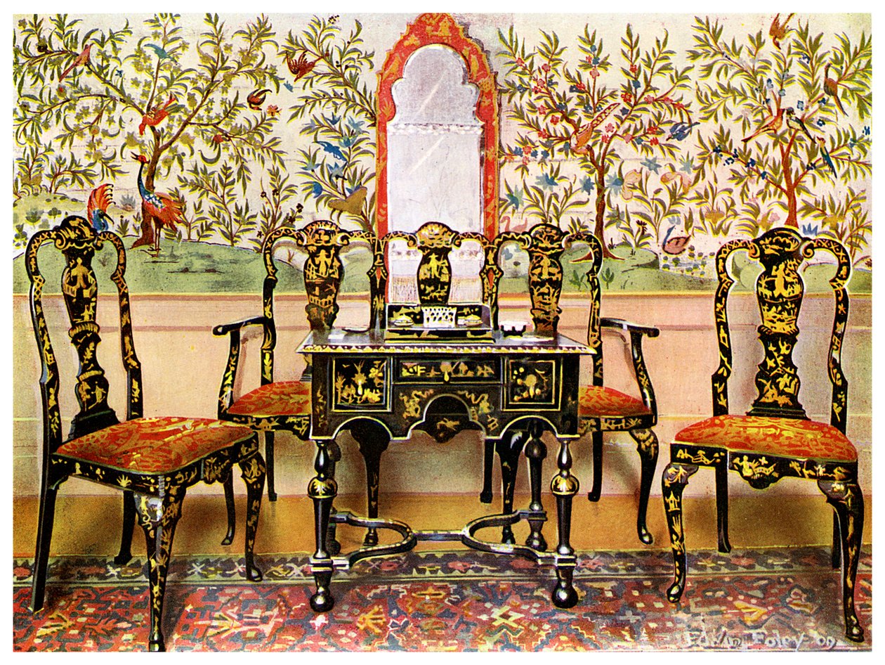 Black lacquer settee, chairs and table and red lacquer mirror by Edwin Foley
