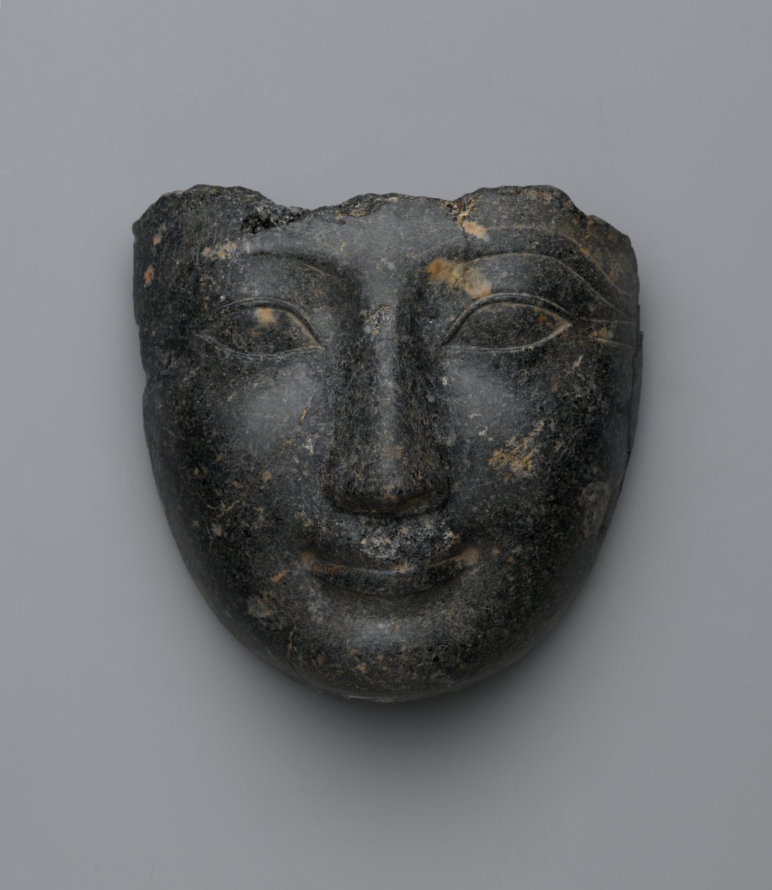 Face from a sarcophagus cover, purchased in Luxor, New Kingdom by Egyptian 18th Dynasty