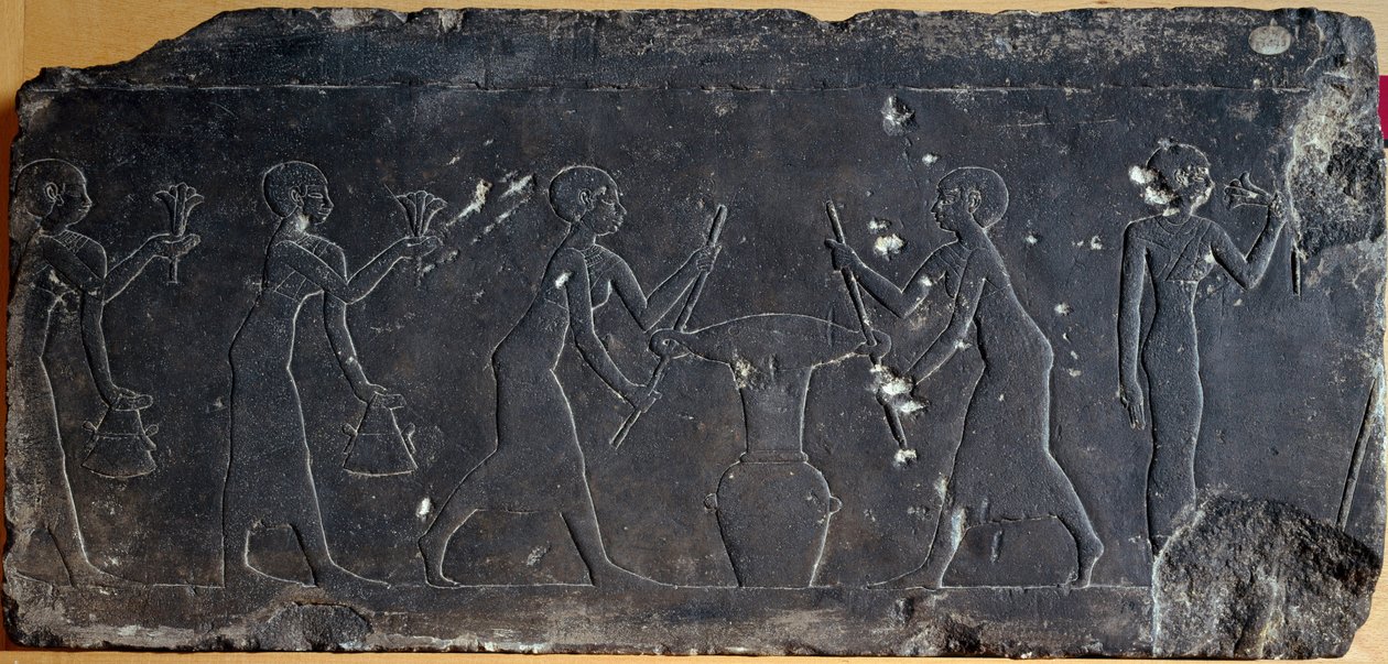 Limestone plate decorated with low relief representing the pressing of lotus flowers, 8th to 7th century BC (relief) by Egyptian School