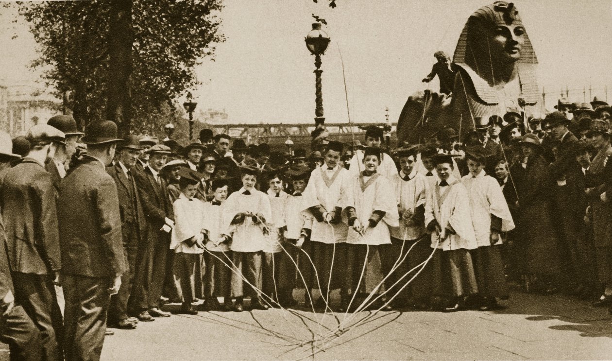 Choir boys of St. Clement Danes marking the boundaries of their parish, on the Embankment by English Photographer