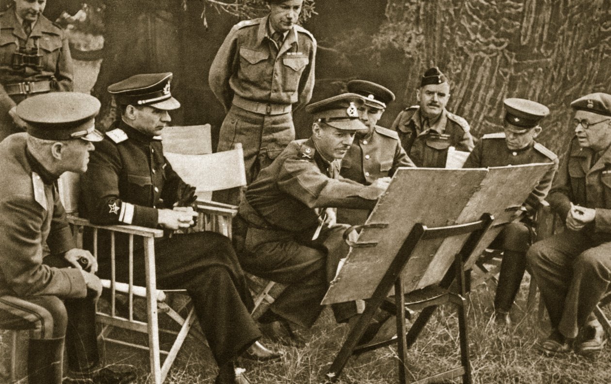 Lieutenant General Dempsey, Commander of the British Second Army, explains to Soviet officers the state of affairs on the Western Front, 1944 by English Photographer