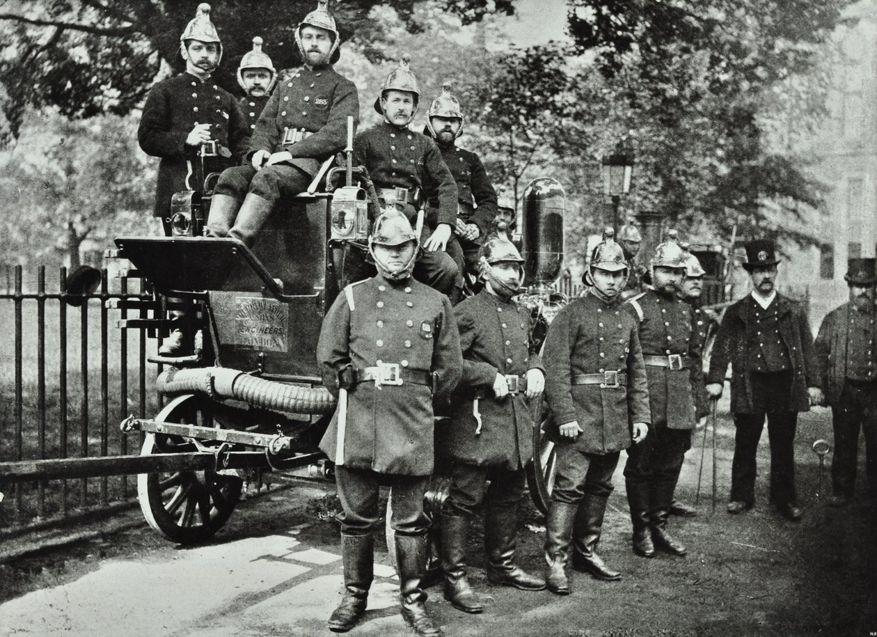 London Fire Brigade: group of firemen, with engine and turncocks by English Photographer