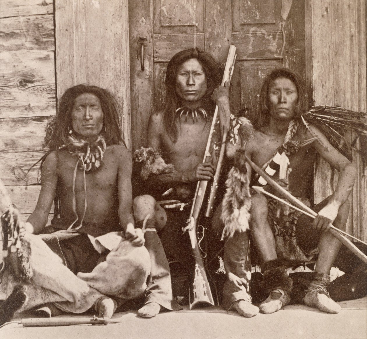 Three Indian Braves, photographed by the Royal Engineers on the Forty-Ninth Parallel by English Photographer