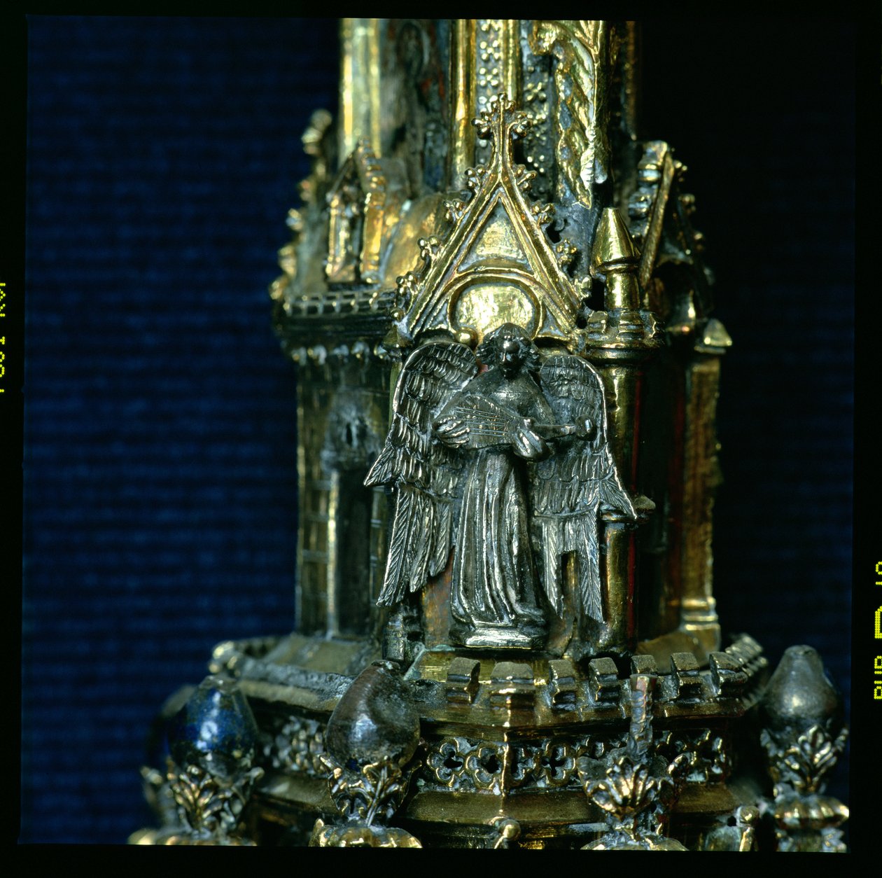 Angel playing a gittern with a plectrum, detail from the crozier of William of Wykeham by English School