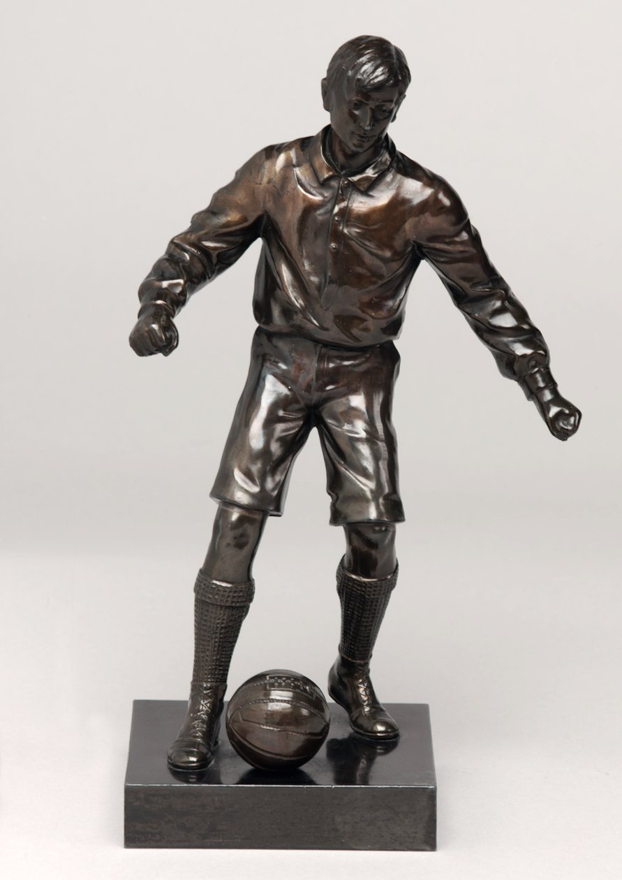 Footballer, part of a clock set by English School