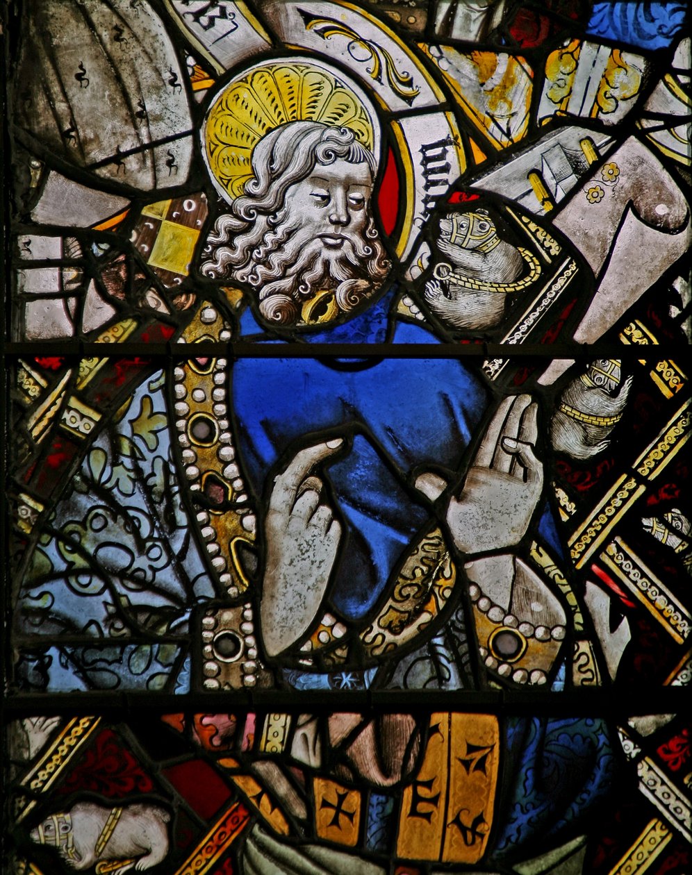 Window depicting a prophet (composite figure) with jewels of inset coloured glass by English School