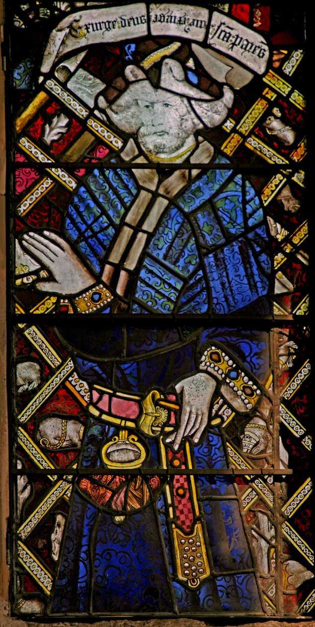 Window depicting a prophet (composite figure) with jewels of inset coloured glass by English School