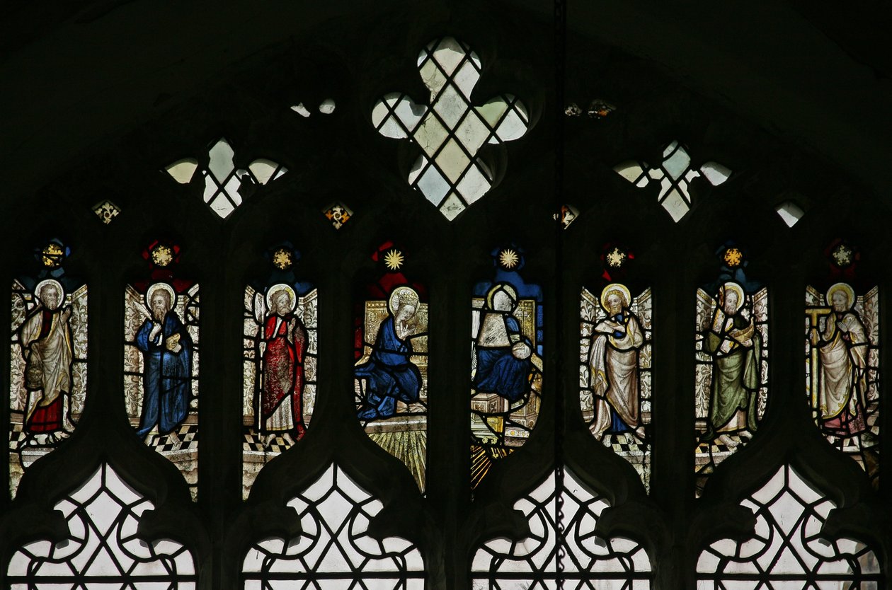 Window depicting tracery lights with an array of saints including Philip, Bartholomew, Matthias, Simon, Jude, and Thomas with the Coronation of the Virgin at the center by English School