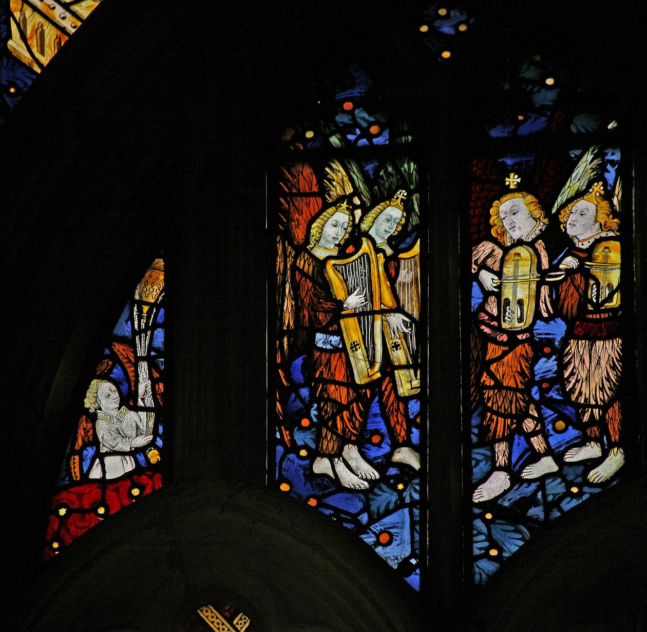 Window depicting musician angels with harps and crwth (Welsh fiddle) by English School