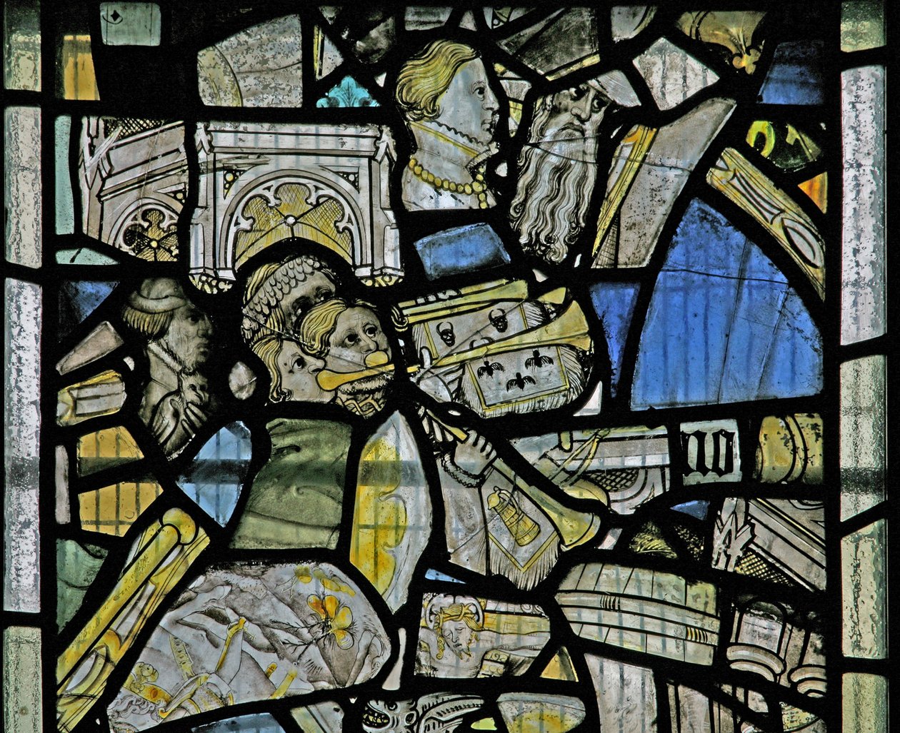 Window depicting details including trumpeters, fragments from a Crucifixion scene, heads and architectural details by English School