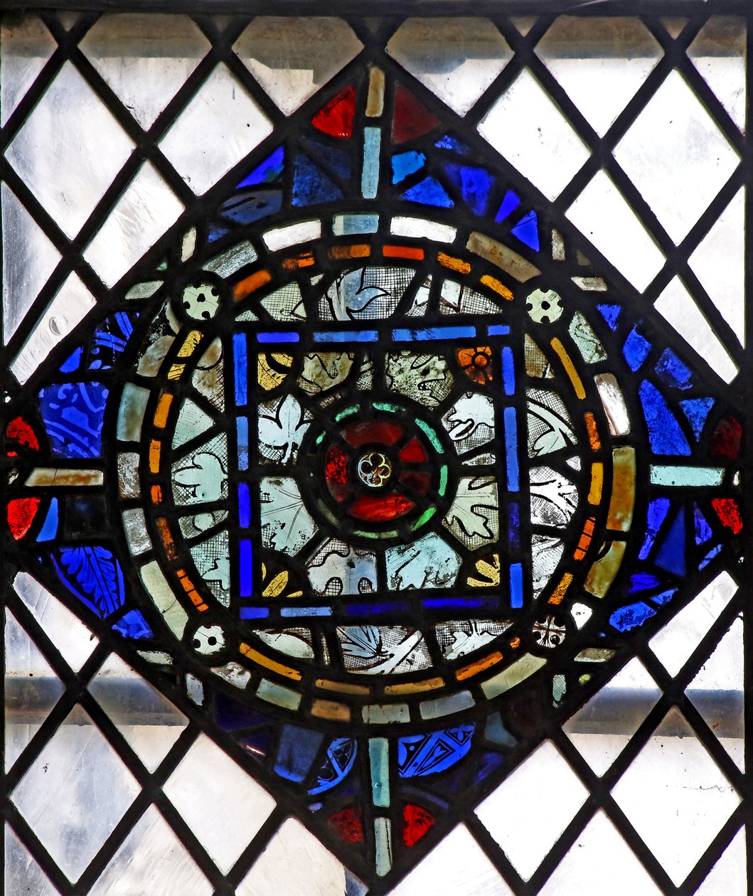 Window s4 depicting a reset geometric panel by English School