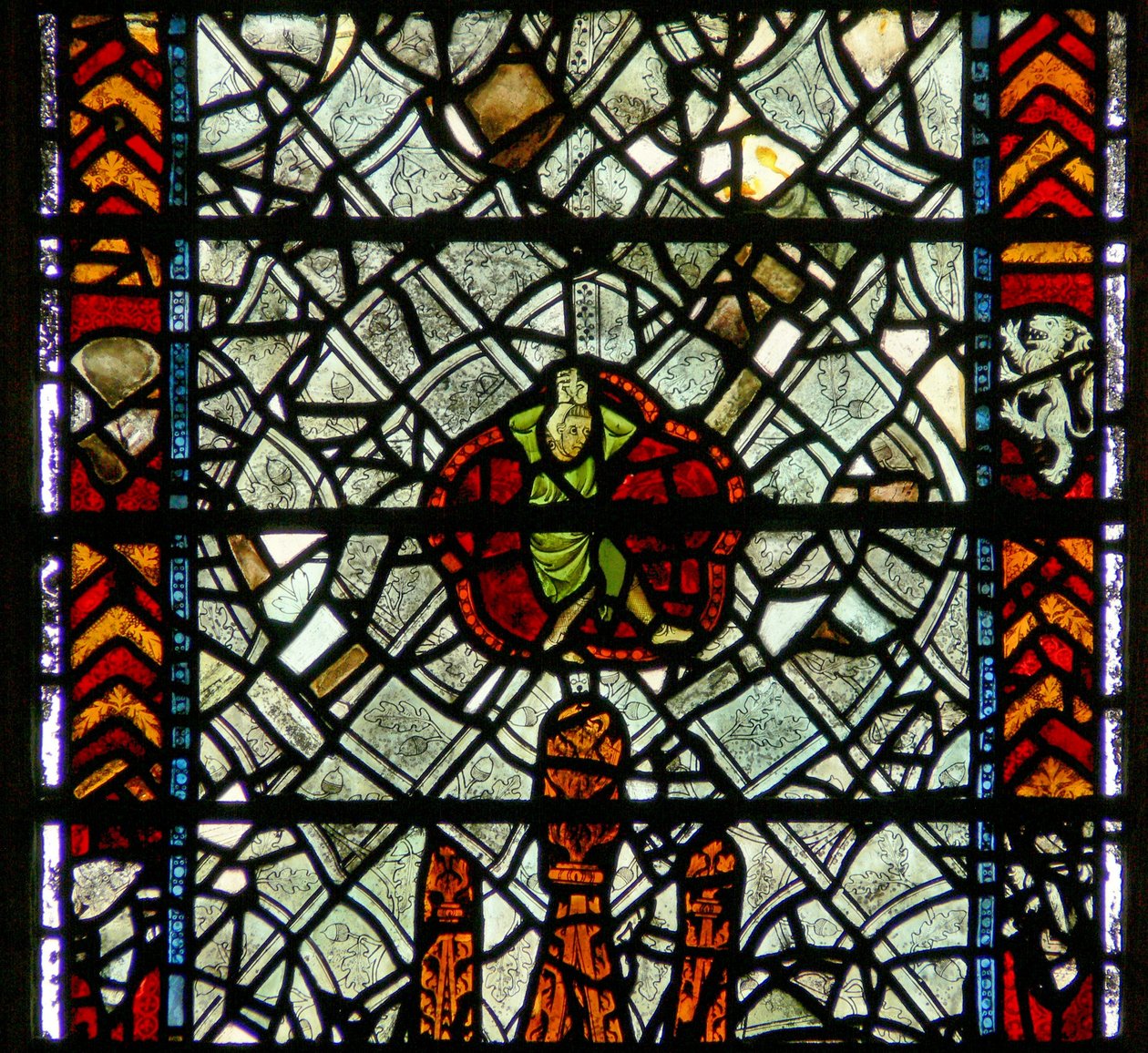Window w39 depicting a figure amid grisaille by English School