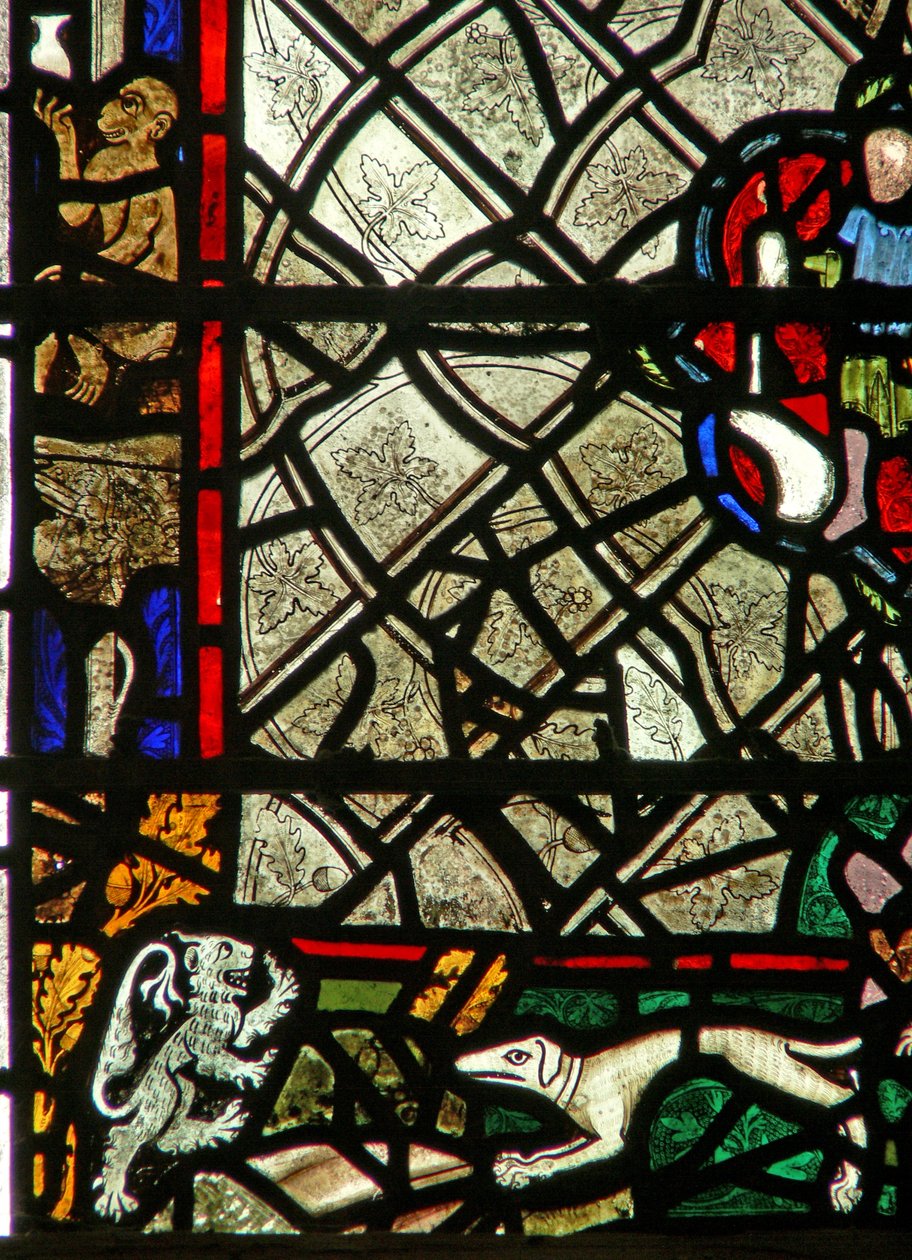 Window w40 depicting a border panel with monkey, lion and a hound; grisaille by English School