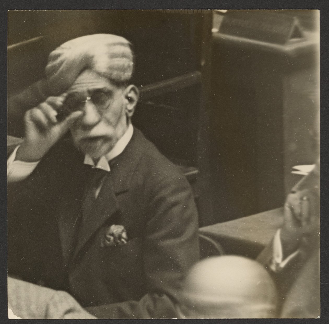 Seated Man in Turban and Dark Glasses by Erich Salomon