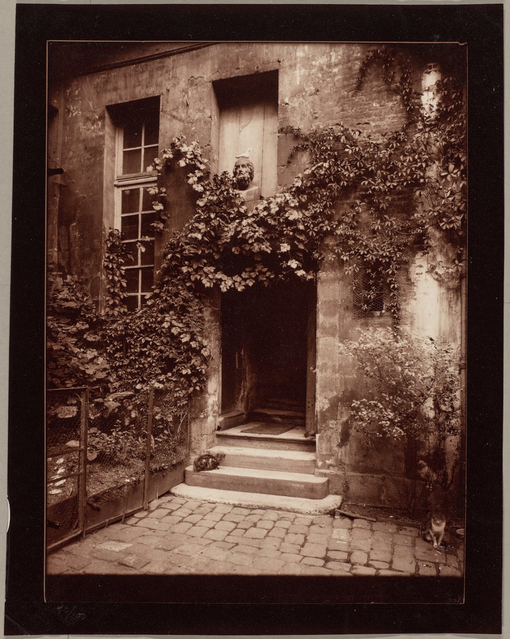 Courtyard in Rouen by Eugène Atget