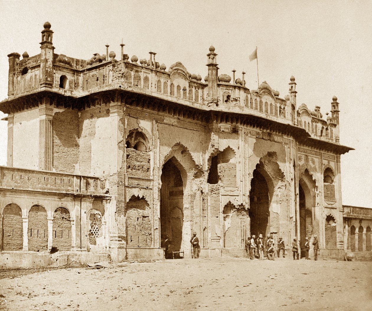 Heavily damaged entrance gateway to the Church of Imaumbarah by Felice Beato