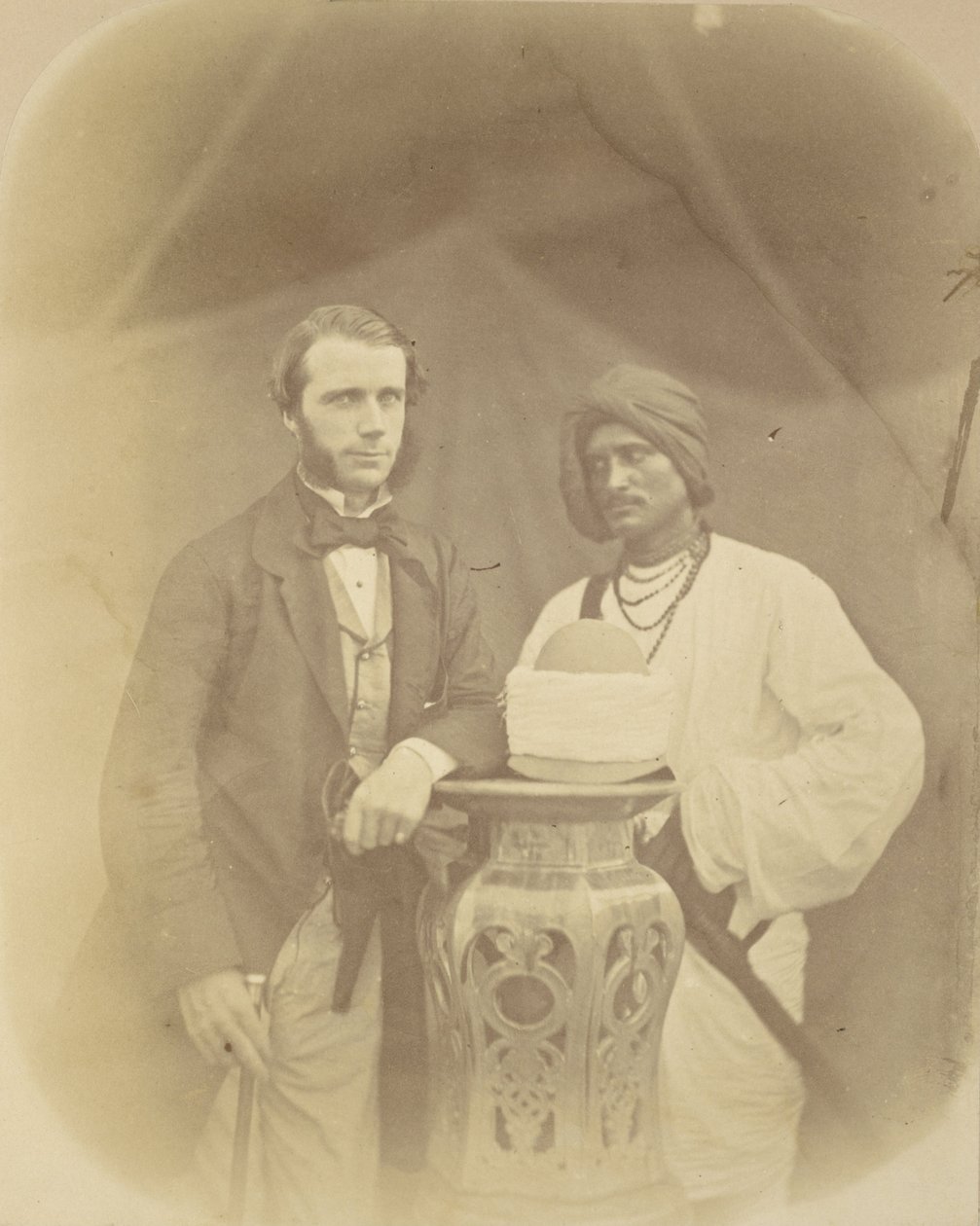 Portrait of J.D. Forsyth, Esq., C.S. Sec., Chief Commander at Oude with his Indian Servant by Felice Beato