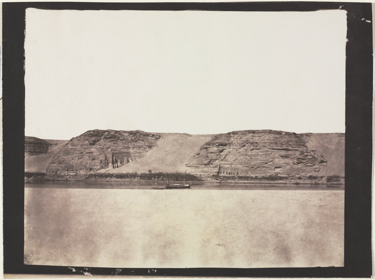 General View of Monuments Carved into Bedrock with Photographer