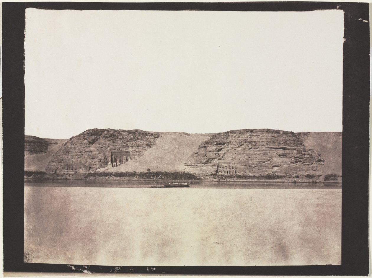 General View of Monuments Carved into Bedrock with Photographers Dahabieh. Abu Simbel by Félix Teynard