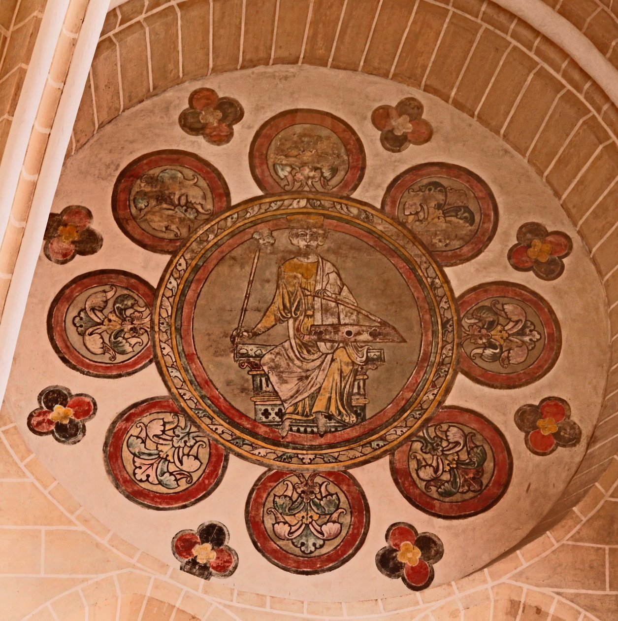 A view of a painted rosette in the western-most bay, south side by French School