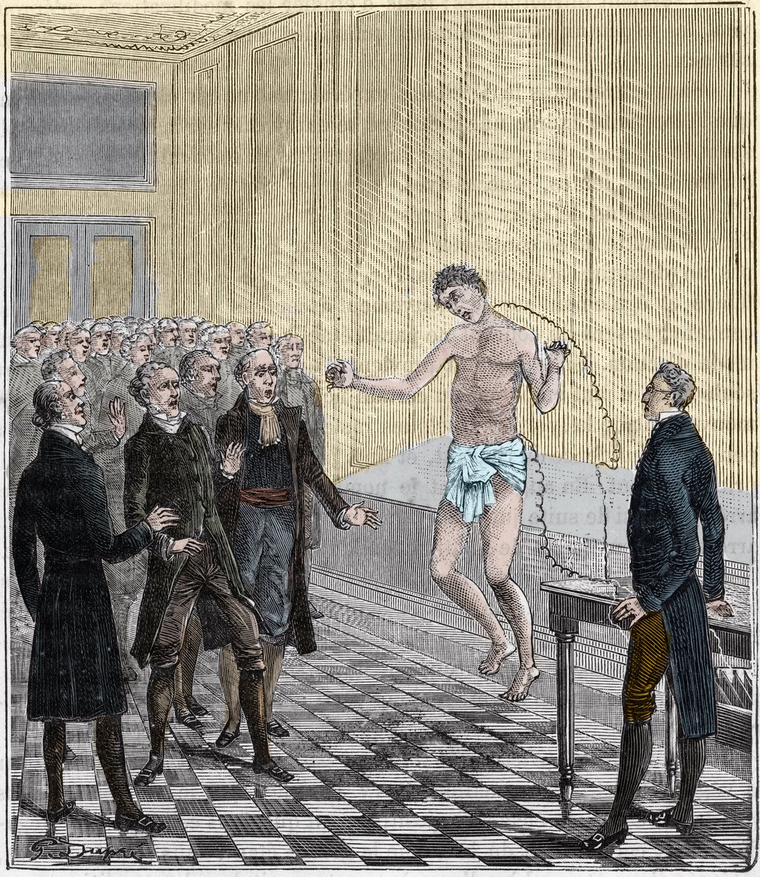 Dr Andrew Ure conducting voltaic experiments on the body of the executed murderer, Clydesdale, in 1818 - Experience by Andrew Ure (1778-1857) on a corpse - Engraving in 