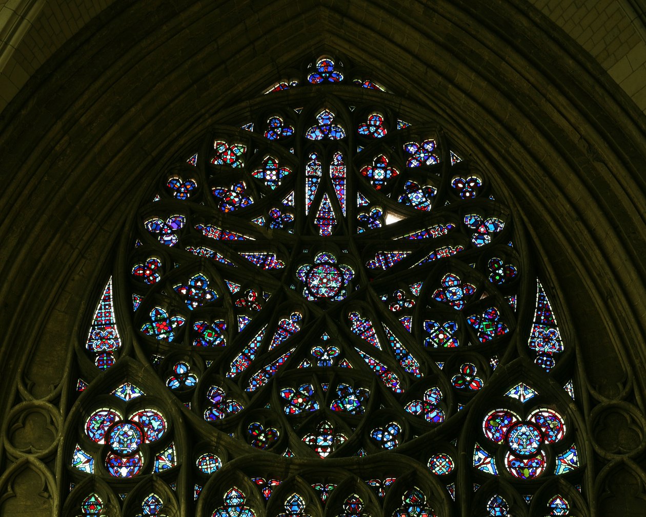 The north rose window with geometric diaper infill by French School
