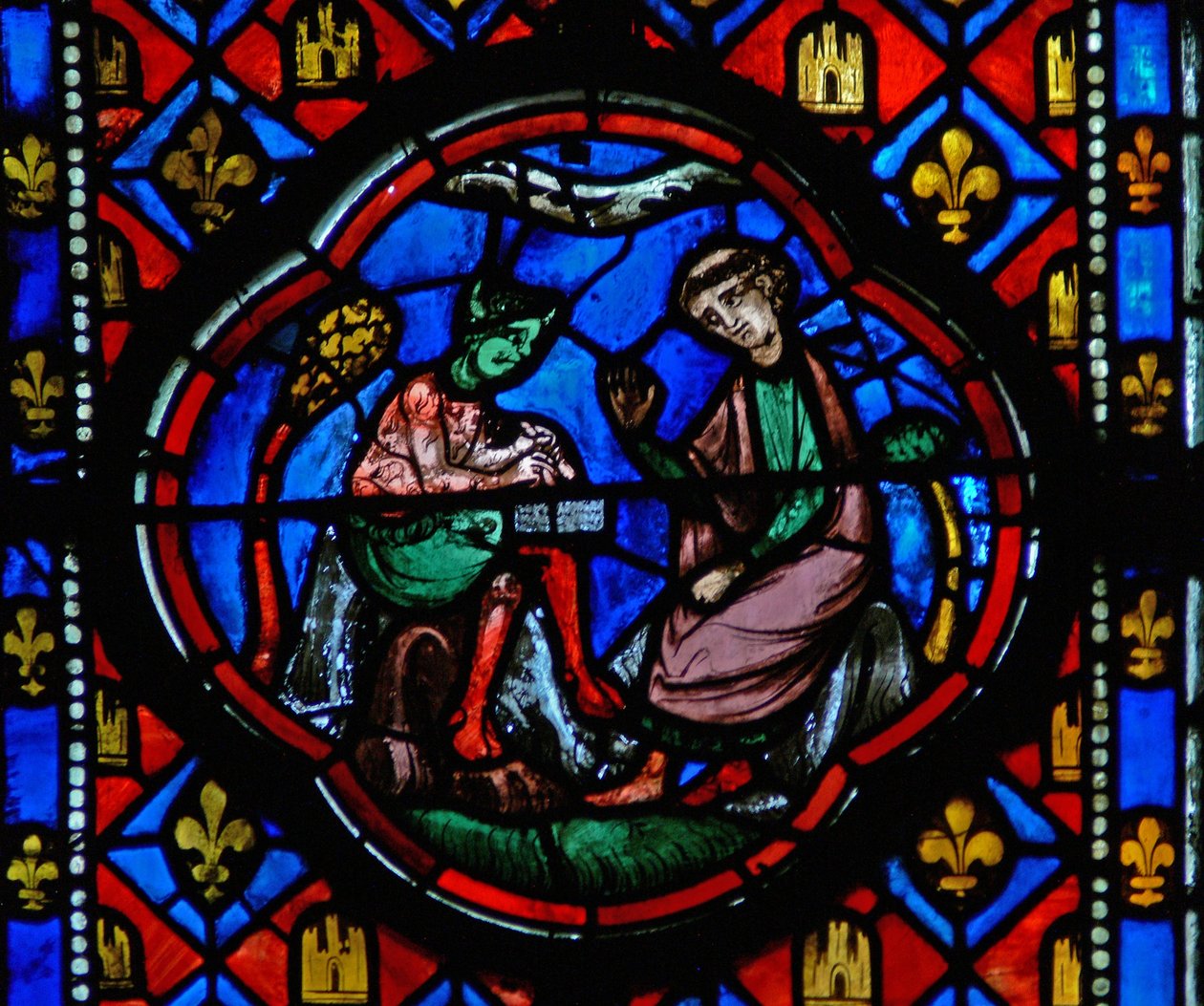 Window Ew-R depicting a scene from the Theophilus story: he signs a pact with the devil by French School