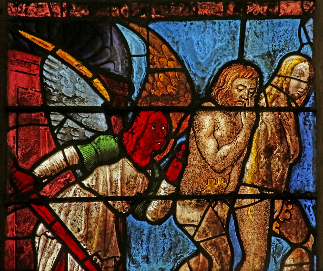 Window depicting Adam and Eve being expelled from Eden