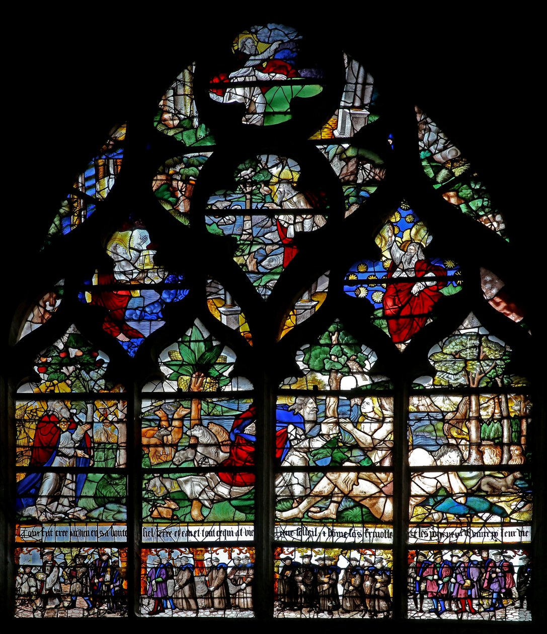 Window w120 depicting the Creation and members of the Confrérie de Charité by French School