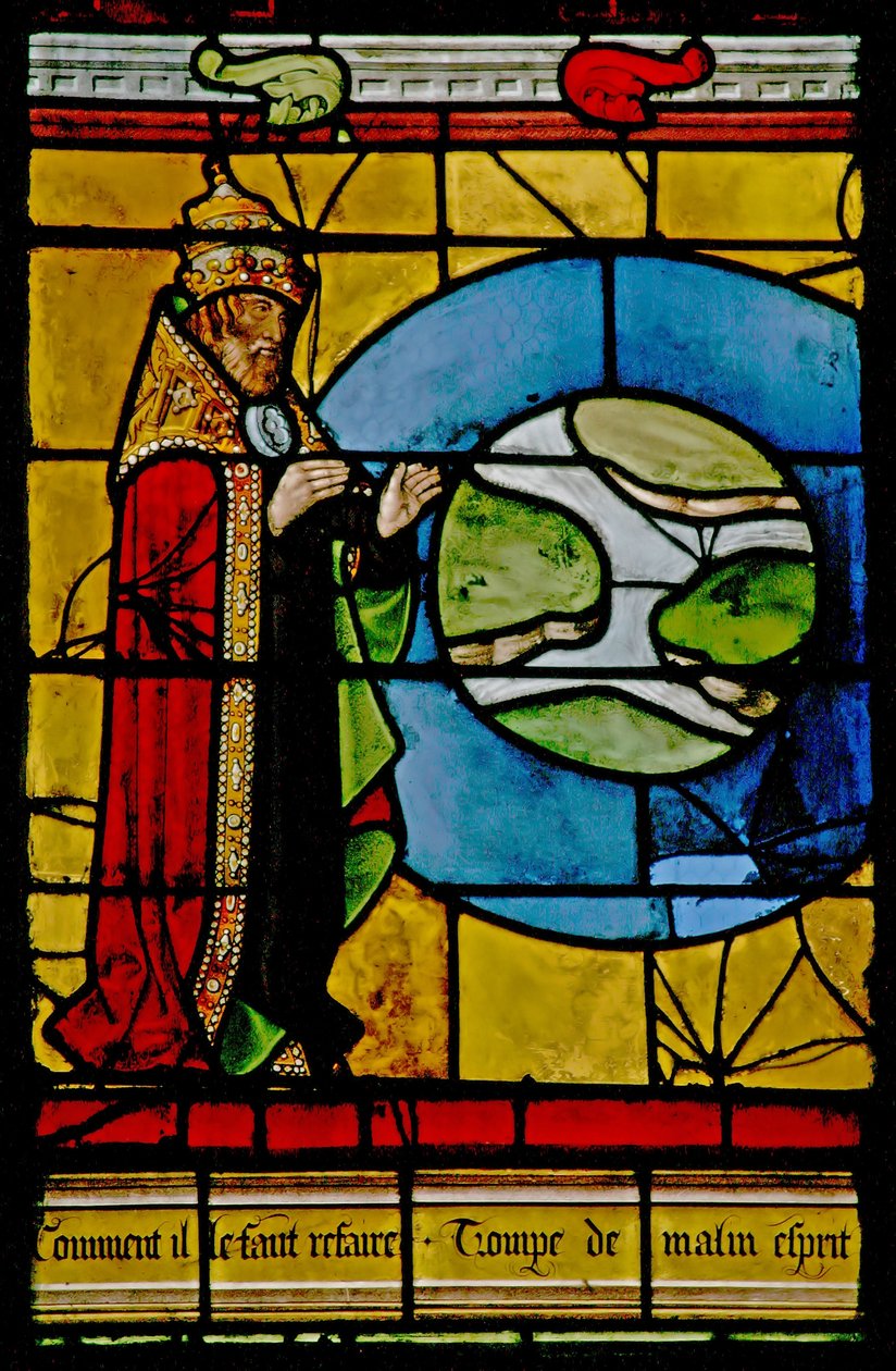 Window depicting God creating the sky around the earth