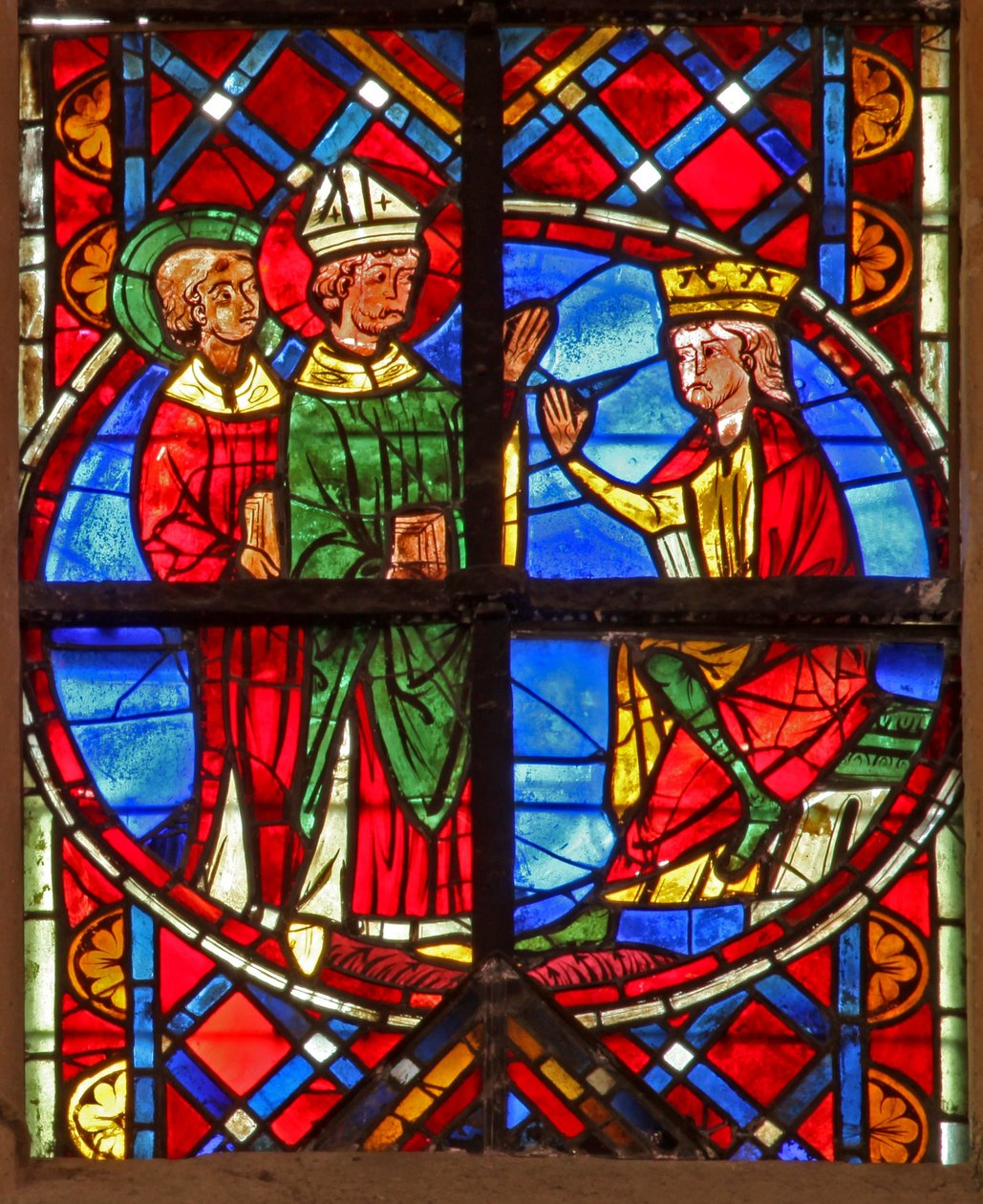 Window depicting a scene from the life of St Vincent: the saint before ...