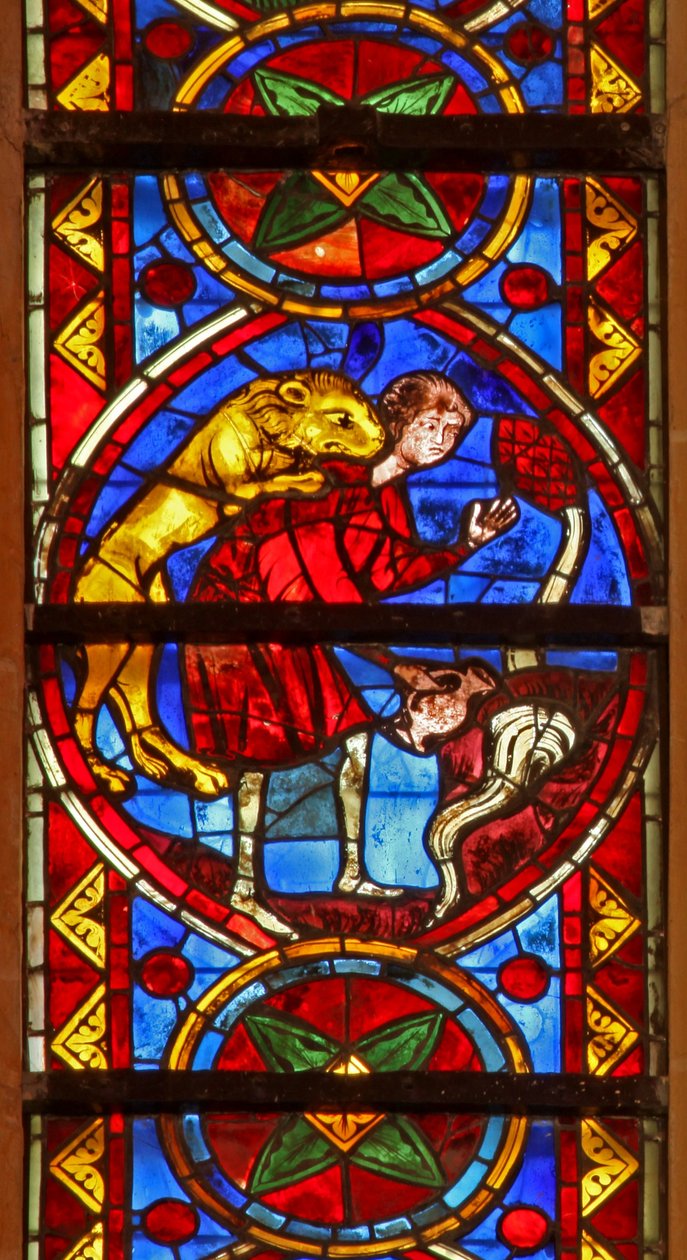 Window w213 depicting a scene from the life of St Thomas: a lion ...