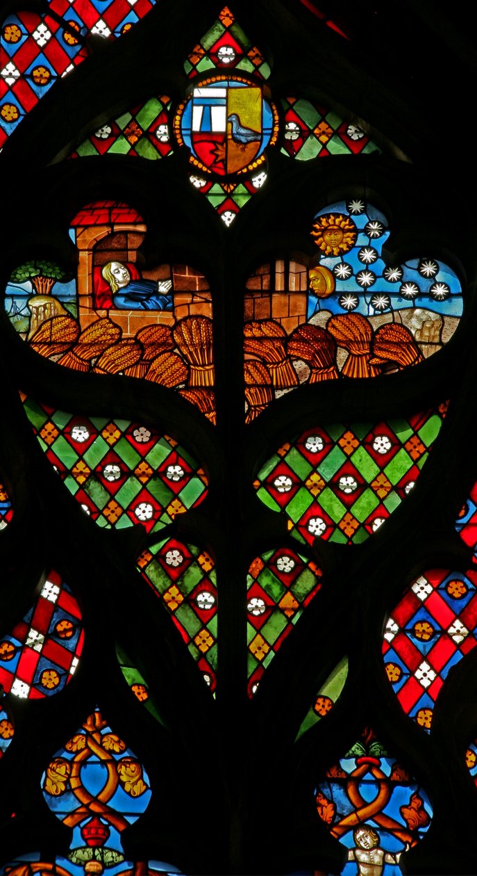 Tracery light with Joseph dreaming of the sun, moon and stars, and that his brothers