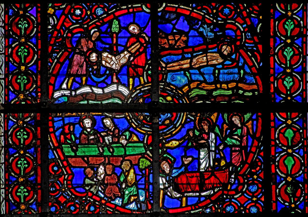 Window depicting scenes from life of St Lawrence