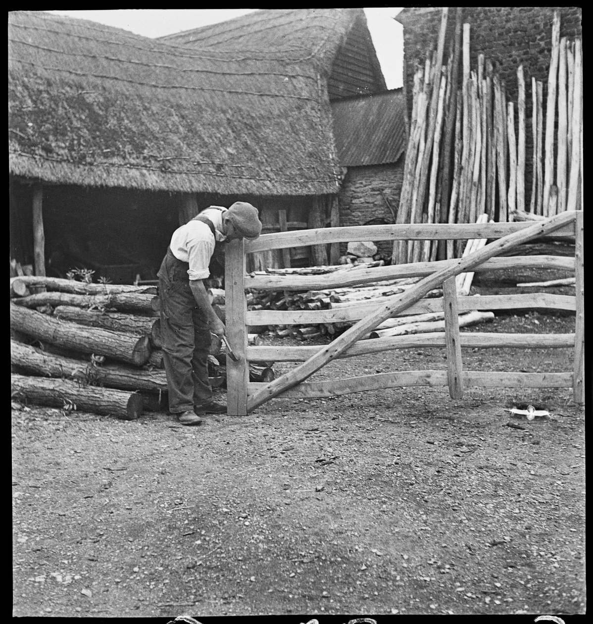 A man making a field gate in Aston by George R. Long