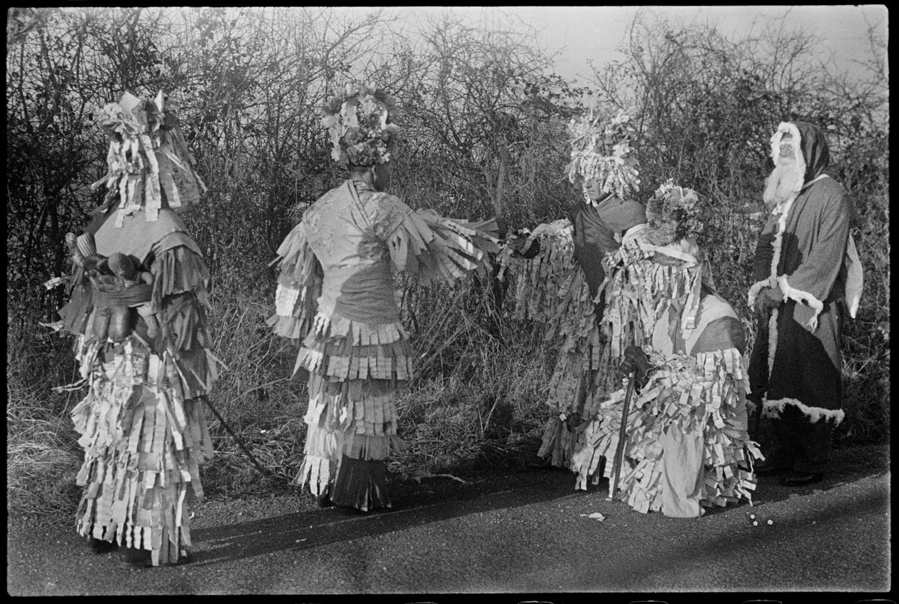 People in costume performing in a Mummers
