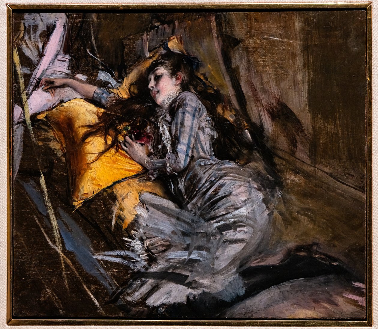 Reclining Girl in Tartan Dress by Giovanni Boldini