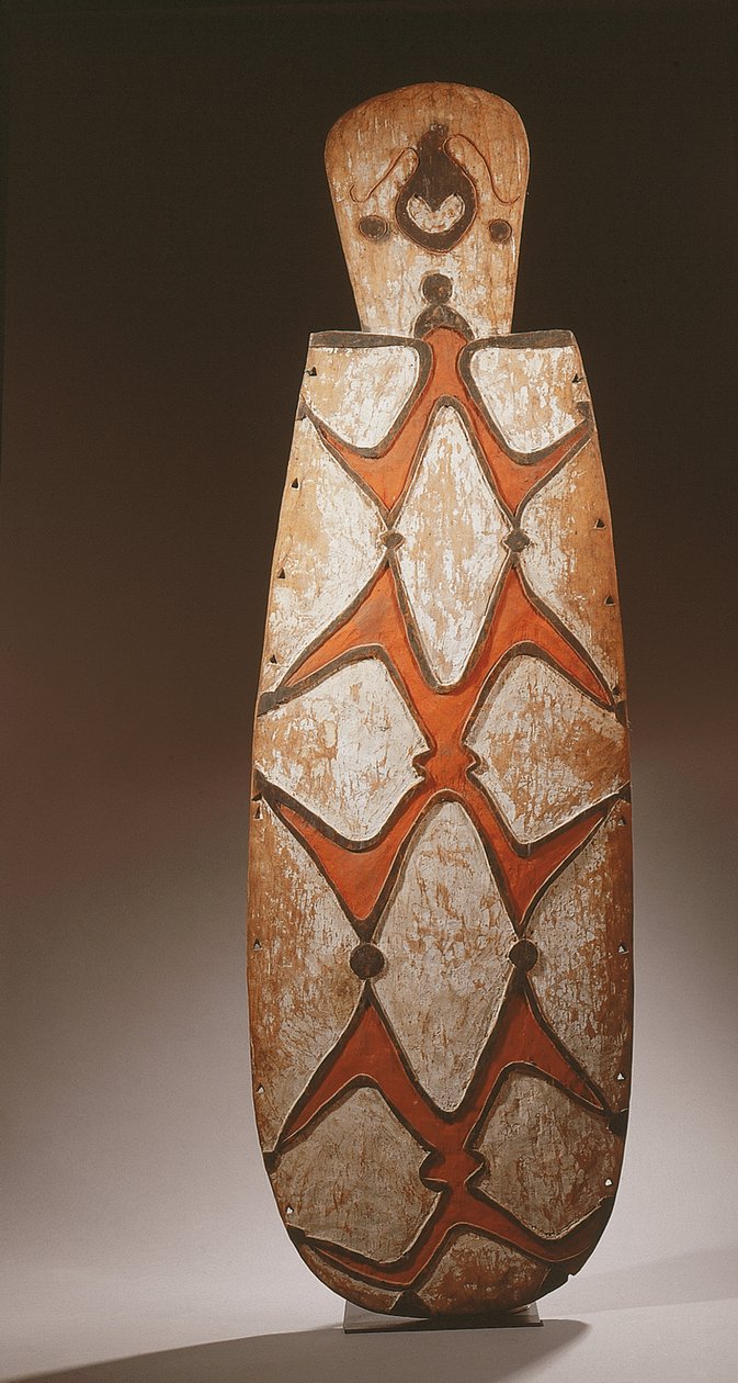 Oval Asmat Shield, Carved in Relief with Stylised Figures, a Mask at the Top by Guinean New