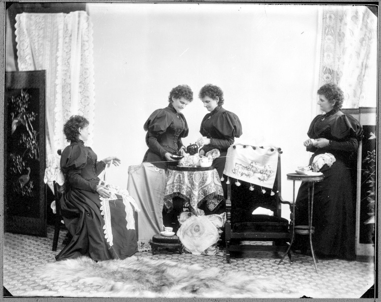 Multiple Exposure of Hannah Maynard - Two Having Tea, One Holding a Skein of Cotton, One Taking it Up into a Ball by Hannah Maynard