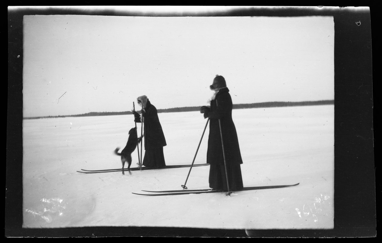 Blenda and Elsa Simberg Skiing, Balu Also on the Ski Trip by Hugo Simberg