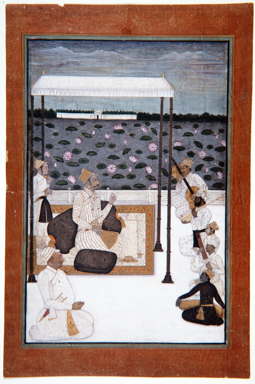 A nobleman listens to music under a canopy on a terrace by a lake by Indian School