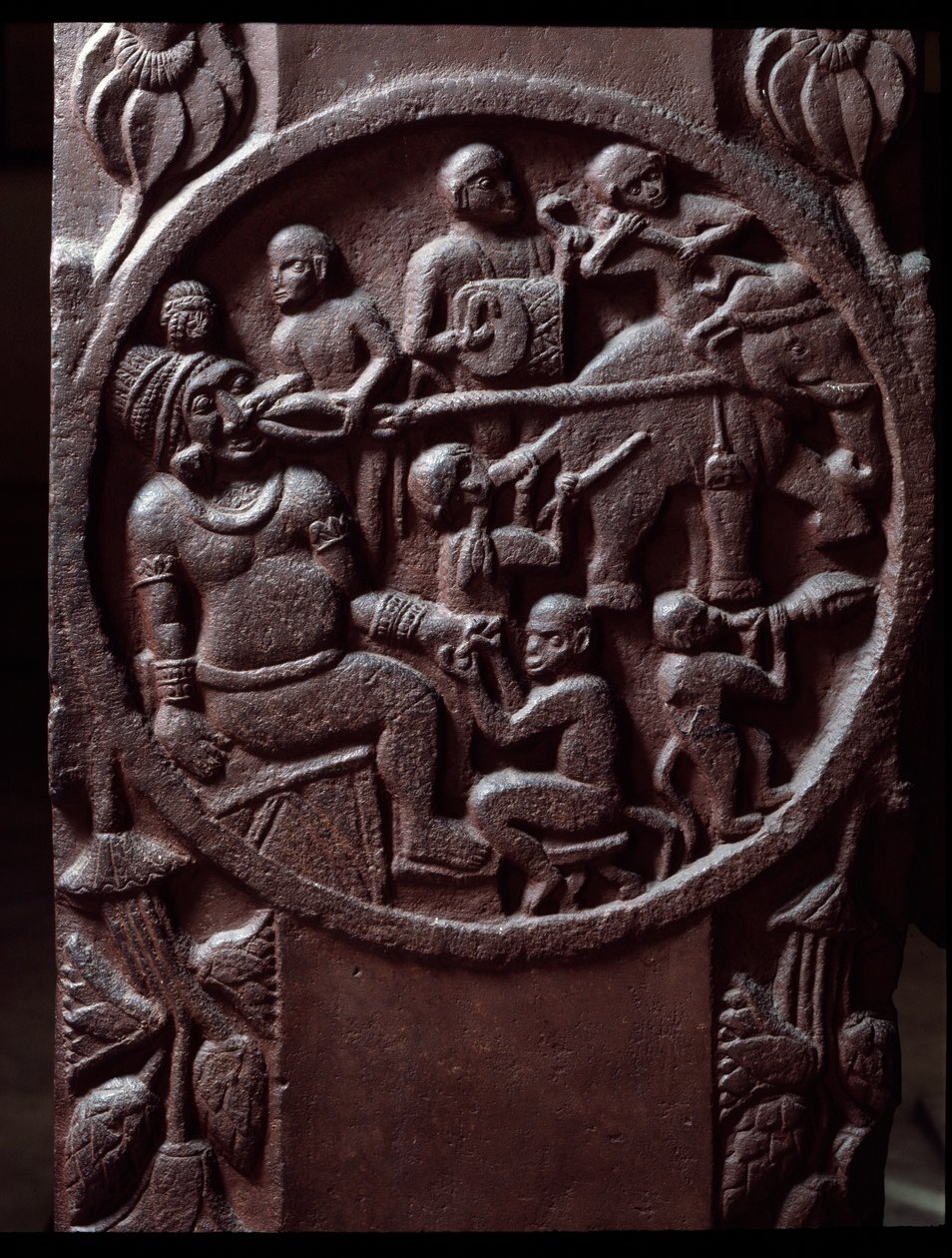 Buddhism: Monkeys capture an elephant and drag it to extract the giant