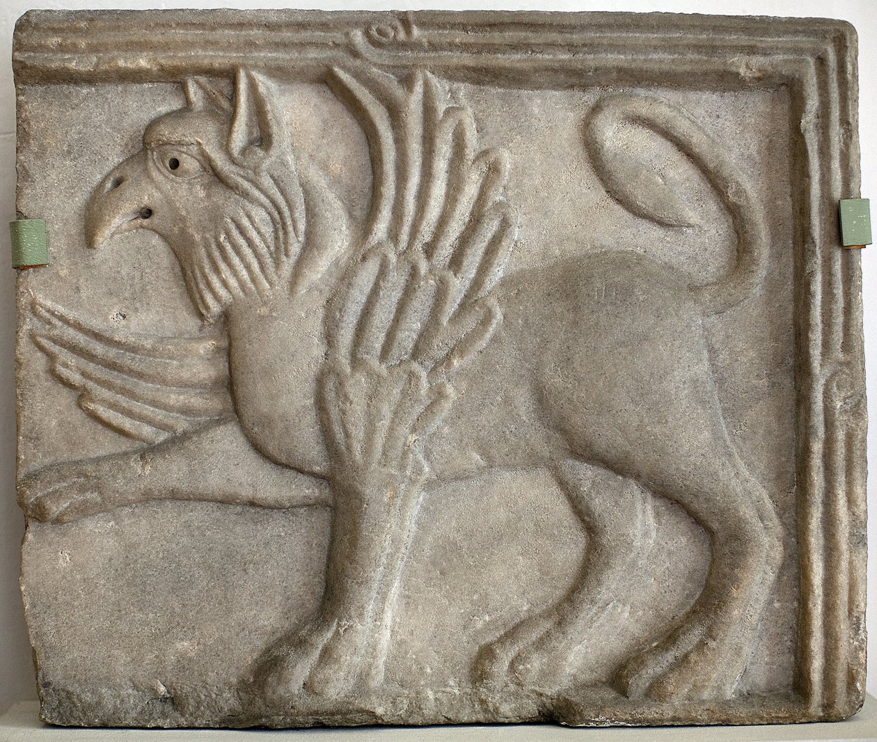 Griffon (or gryphon). Low relief sculpted, marble, Venice (Italy) 12th century. National Gallery, Sternberg Palace, Prague (Czech Republic) by Italian School