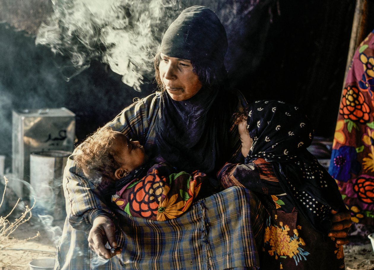 Syrian Bedouin Woman with Her Small Children in a Tent by James L Stanfield
