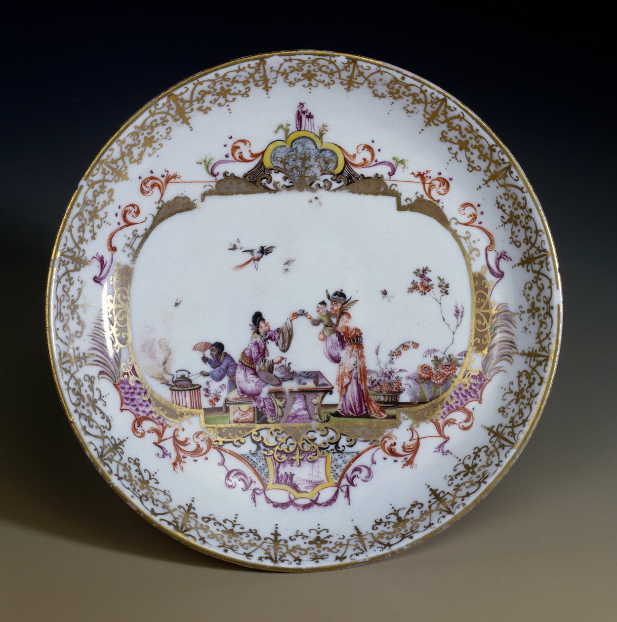 Meissen Porcelain. Chinoiserie representing Asian characters drinking tea. Saucer decorated by Johann Gregor Hoeroldt, circa 1730 by Johann Gregor Herold
