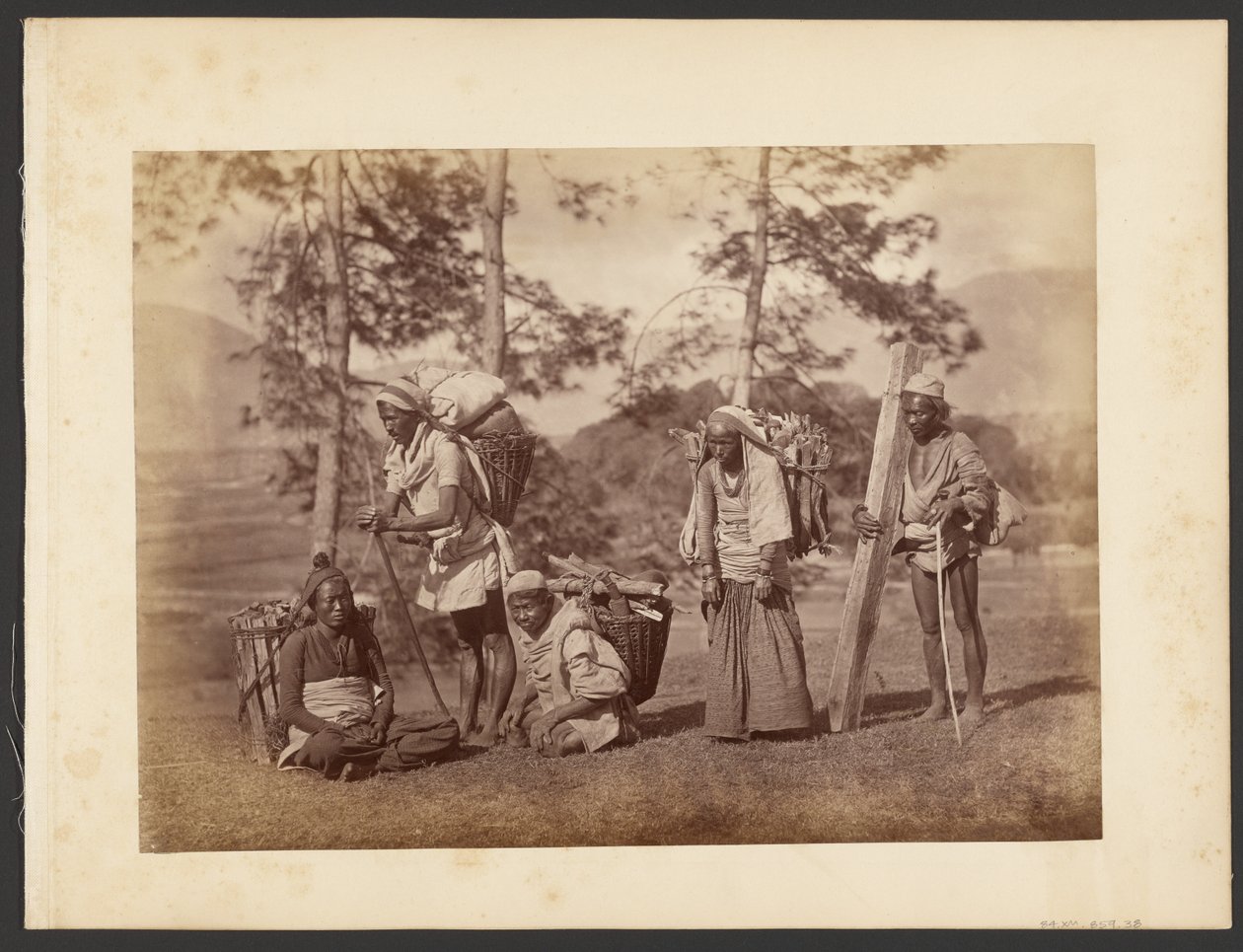 Group of Men Carrying Baskets by John Thomson