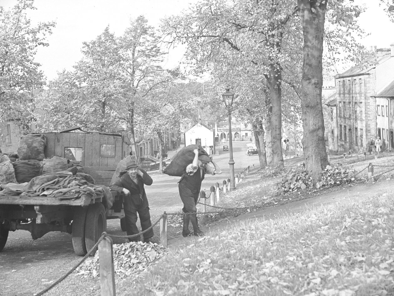 Lorry on Street with Two Coalmen Carrying Sacks of Coal by Joseph Hardman