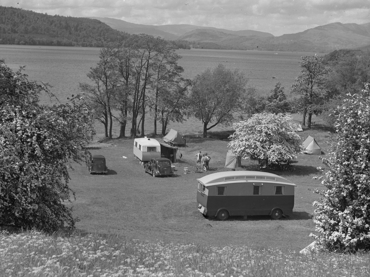 Tents and caravans in a field at Wastwater, lake and hills in background by Joseph Hardman