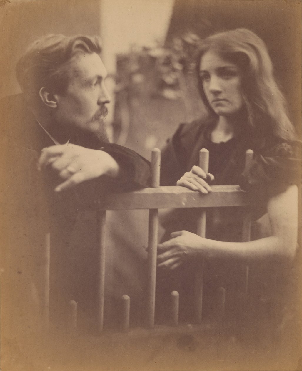 Young Man and Woman Leaning on a Picket Fence by Julia Margaret Cameron