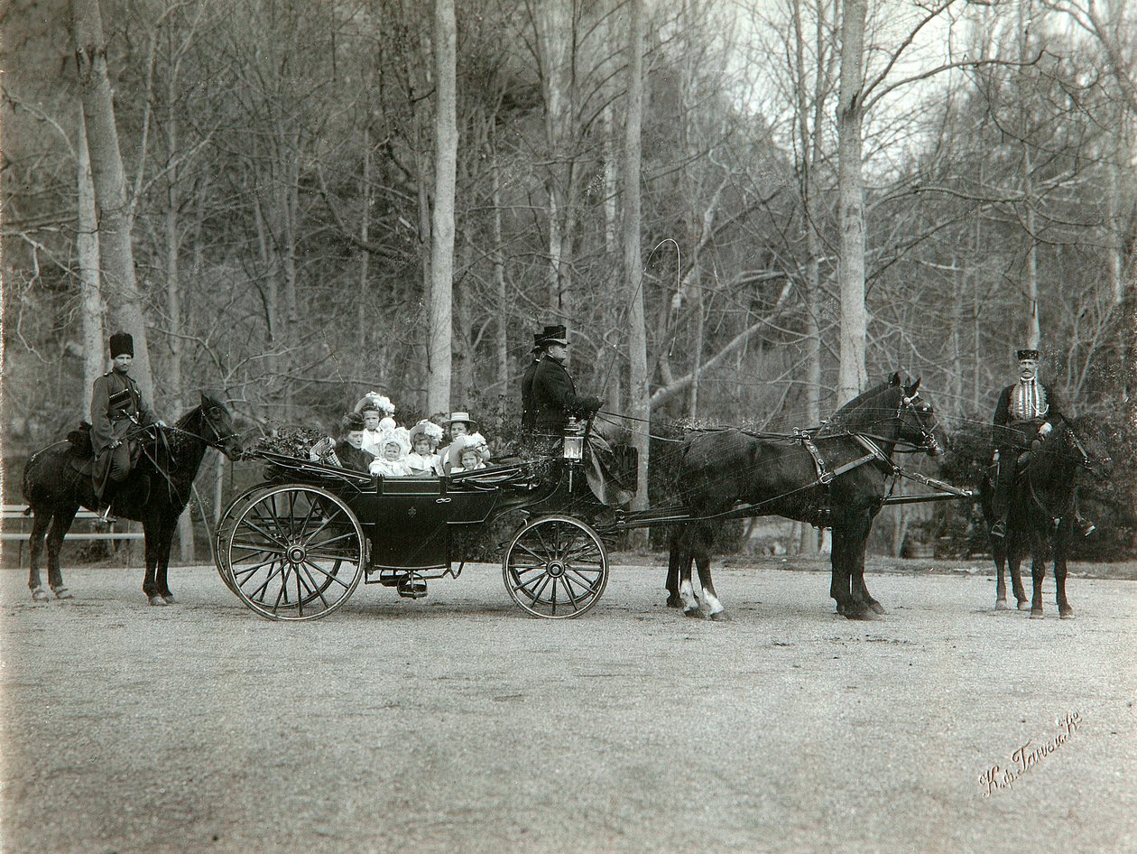 Tsar Nicholas II of Russia with his family in the park of Tsarskoye Selo, Russia by K. von Hahn
